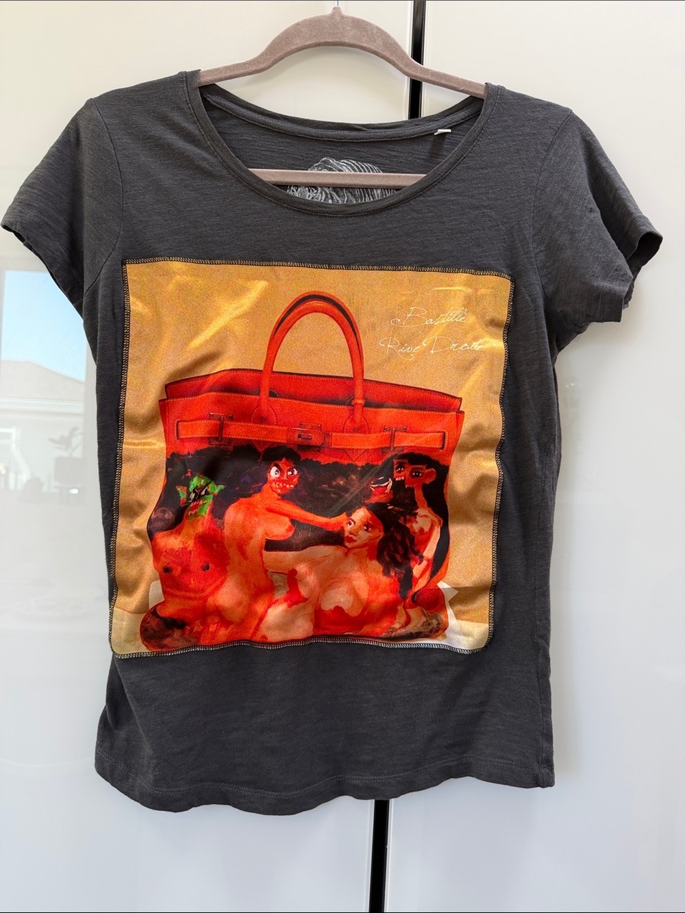 Bastille
Women's Black Tee with Red Handbag artwork